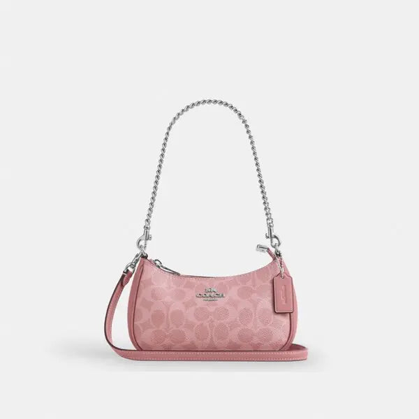 Teri mini crossbody bag in signature canvas