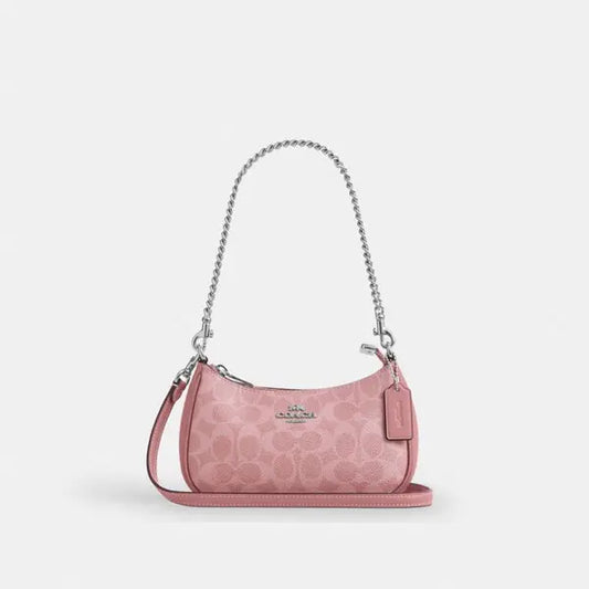 Teri mini crossbody bag in signature canvas