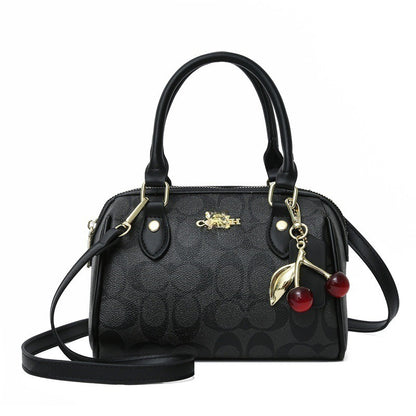 Mini Rowan Crossbody Bag In Signature Canvas